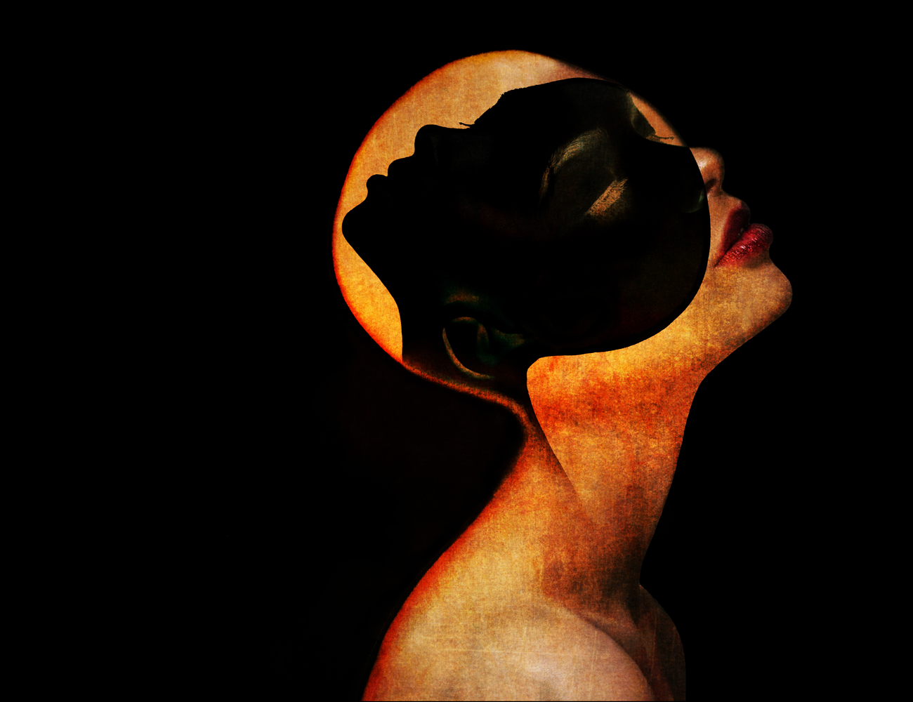 bald woman wearing mask that looks like a woman's silhouette