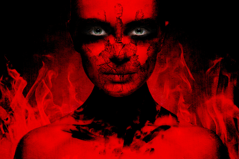angry woman in front of flames